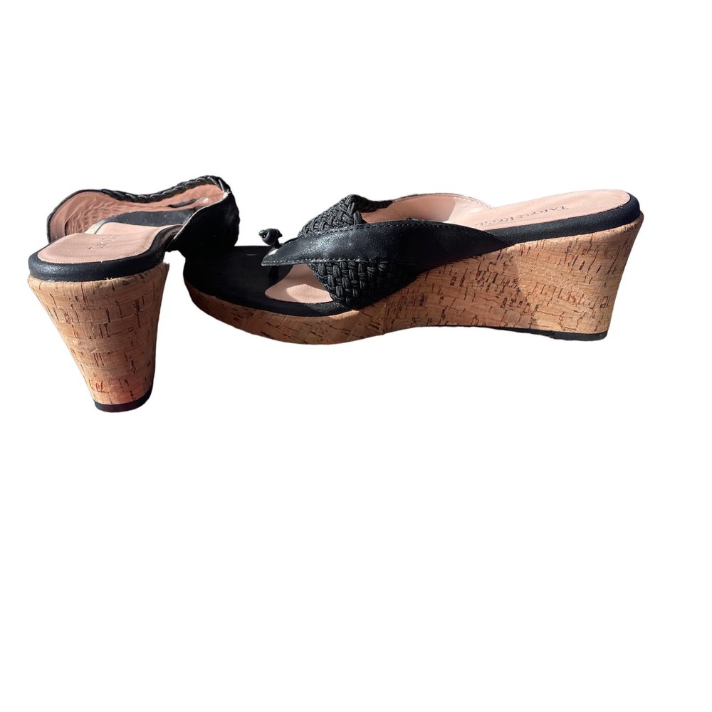 Taryn Rose 3” thing like cork heels, in a size 9.